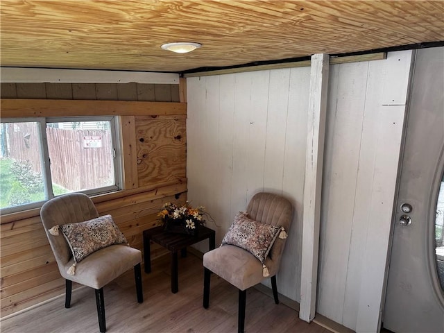300 W Sea Ave, Independence, MO 64050 - sitting room featuring wooden ceiling, wooden walls, and wood finished floors