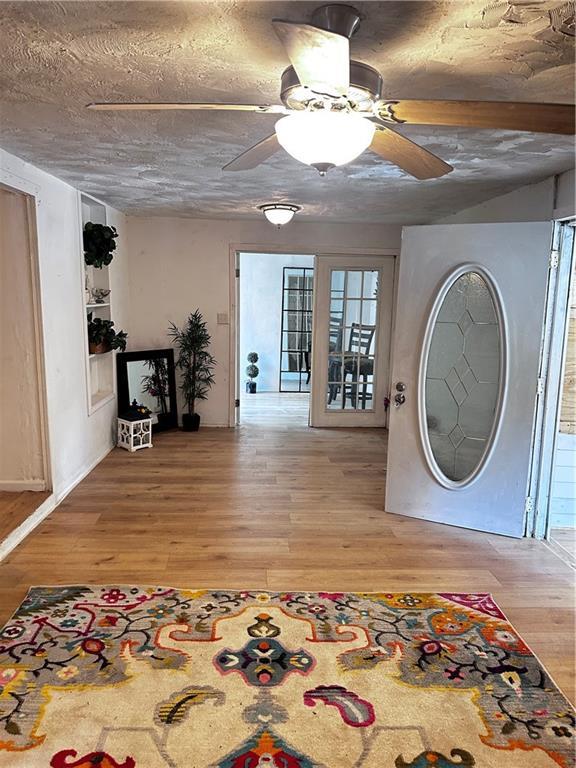 300 W Sea Ave, Independence, MO 64050 - entryway with wood finished floors and a ceiling fan