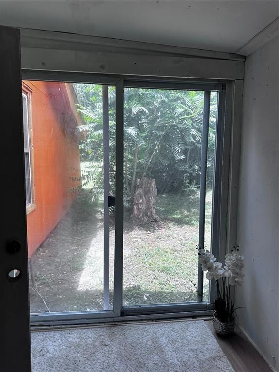 300 W Sea Ave, Independence, MO 64050 - doorway to outside featuring wood finished floors