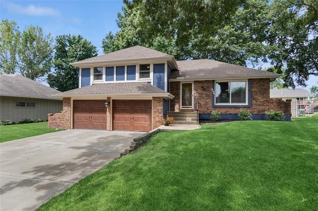 604 SE Richardson Pl, Lees Summit, MO 64063 - split level home with driveway, a front lawn, a garage, and brick siding