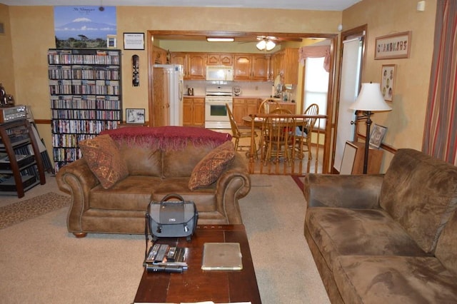 13655 S Sycamore St, Olathe, KS 66062 - living room with carpet and a ceiling fan