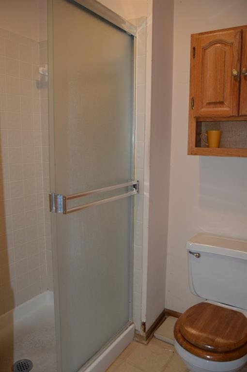 13655 S Sycamore St, Olathe, KS 66062 - full bathroom with a stall shower and toilet