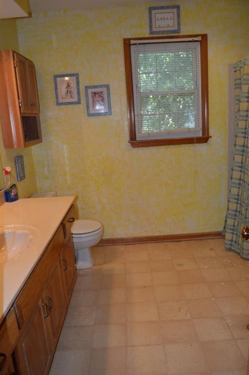 13655 S Sycamore St, Olathe, KS 66062 - bathroom featuring vanity, tile patterned floors, and curtained shower