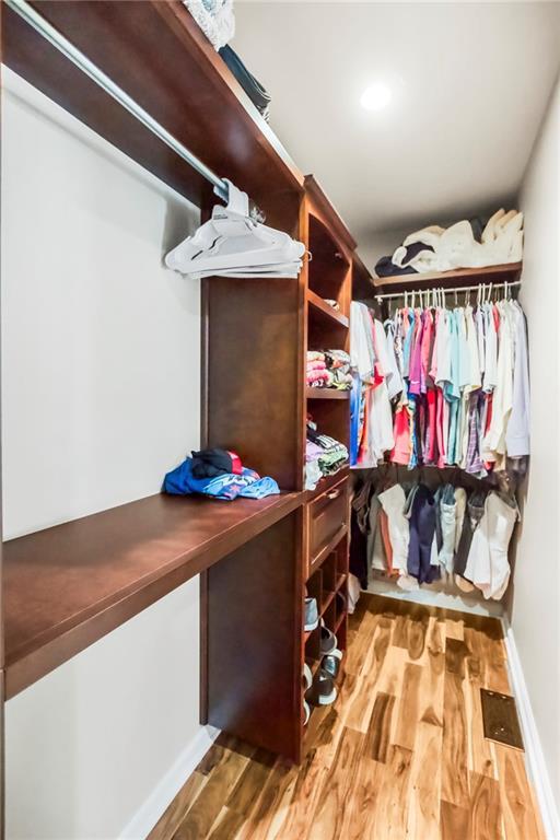 5490 W 85th Ter, Prairie Village, KS 66207 - spacious closet with wood finished floors