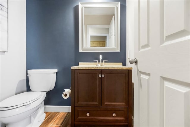 5490 W 85th Ter, Prairie Village, KS 66207 - bathroom featuring vanity and wood finished floors
