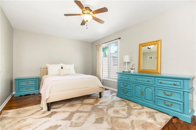 5490 W 85th Ter, Prairie Village, KS 66207 - bedroom featuring wood finished floors and ceiling fan