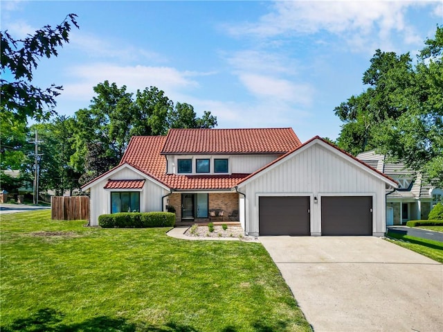 5490 W 85th Ter, Prairie Village, KS 66207 - view of front of house with a tile roof, an attached garage, concrete driveway, and board and batten siding