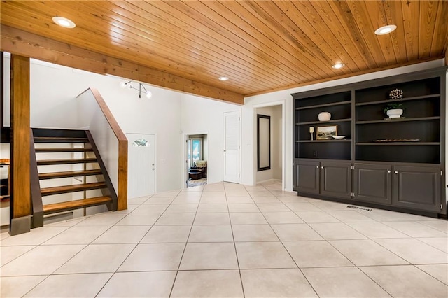 5490 W 85th Ter, Prairie Village, KS 66207 - unfurnished living room featuring wooden ceiling, stairway, recessed lighting, built in features, and light tile patterned floors