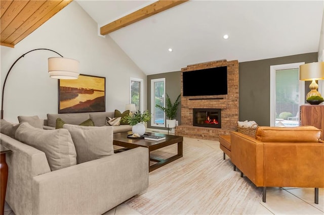 5490 W 85th Ter, Prairie Village, KS 66207 - living room featuring healthy amount of natural light, a brick fireplace, recessed lighting, and light tile patterned floors