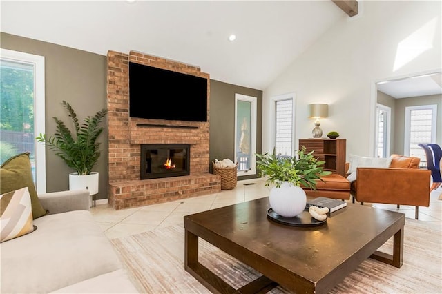 5490 W 85th Ter, Prairie Village, KS 66207 - living room with light tile patterned floors, a brick fireplace, high vaulted ceiling, and recessed lighting