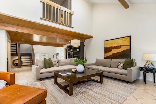 5490 W 85th Ter, Prairie Village, KS 66207 - living area featuring light tile patterned floors, stairway, and beam ceiling