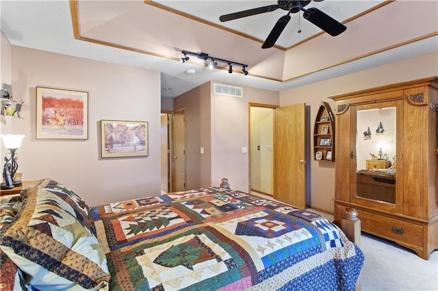 1684 Quarry Rd, Bates City, MO 64011 - carpeted bedroom with a ceiling fan and track lighting