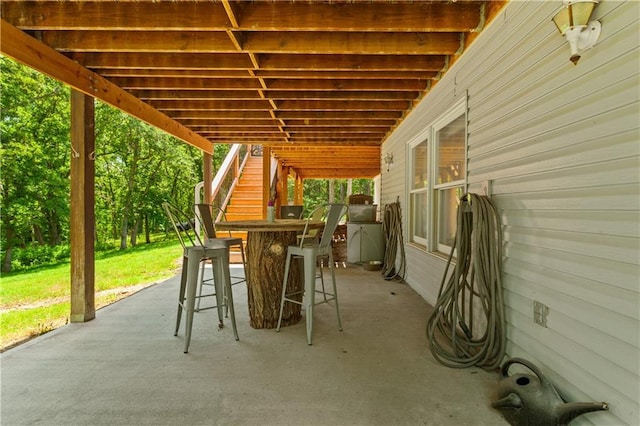 1684 Quarry Rd, Bates City, MO 64011 - view of patio featuring stairway