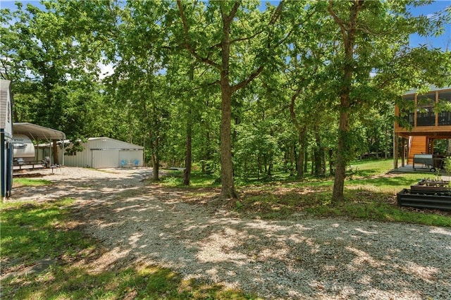 1684 Quarry Rd, Bates City, MO 64011 - view of yard with an outdoor structure and a pole building