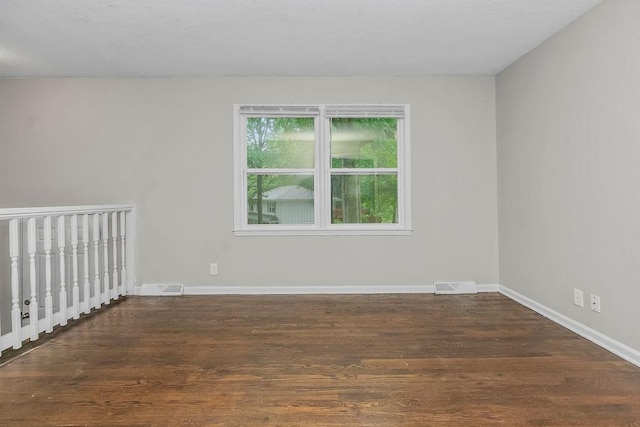 13309 Winchester Ave, Grandview, MO 64030 - spare room with wood finished floors