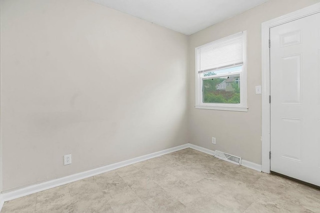 13309 Winchester Ave, Grandview, MO 64030 - spare room featuring baseboards