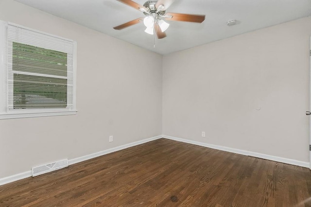 13309 Winchester Ave, Grandview, MO 64030 - empty room featuring wood finished floors, ceiling fan, and a smoke detector