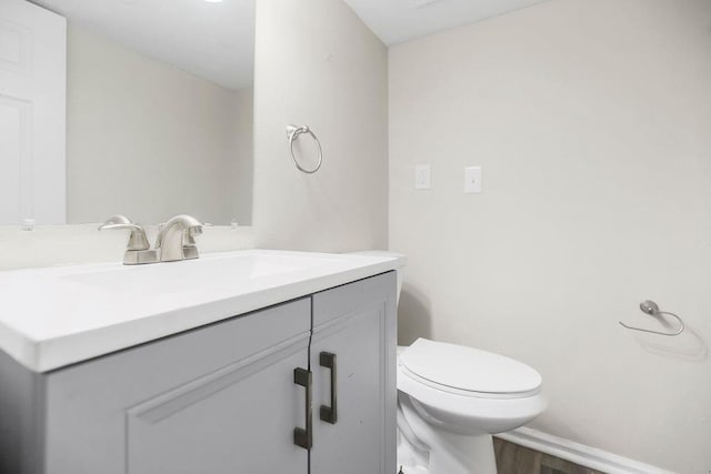 13309 Winchester Ave, Grandview, MO 64030 - bathroom featuring vanity and wood finished floors