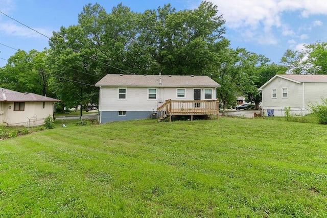 13309 Winchester Ave, Grandview, MO 64030 - back of property featuring a wooden deck