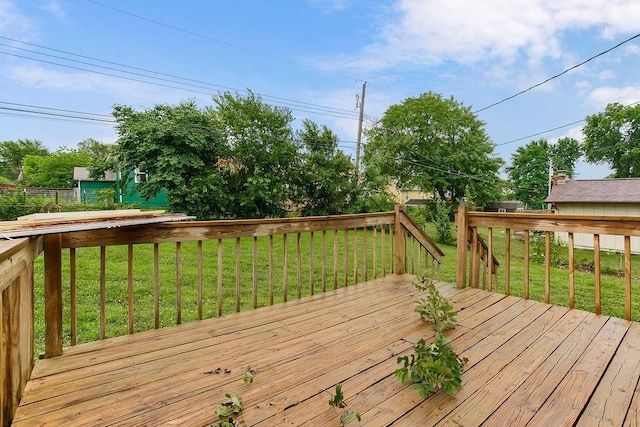 13309 Winchester Ave, Grandview, MO 64030 - wooden deck with a lawn