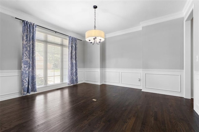 5329 Park St, Shawnee, KS 66216 - empty room with a chandelier, crown molding, a wainscoted wall, wood finished floors, and a decorative wall