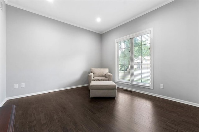 5329 Park St, Shawnee, KS 66216 - sitting room featuring dark wood-style flooring, crown molding, and recessed lighting
