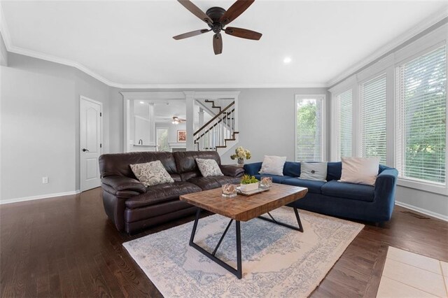 5329 Park St, Shawnee, KS 66216 - living area with a ceiling fan, ornamental molding, plenty of natural light, stairs, and wood finished floors