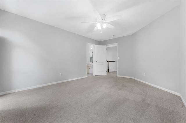 5329 Park St, Shawnee, KS 66216 - unfurnished bedroom with carpet, ensuite bathroom, and a ceiling fan