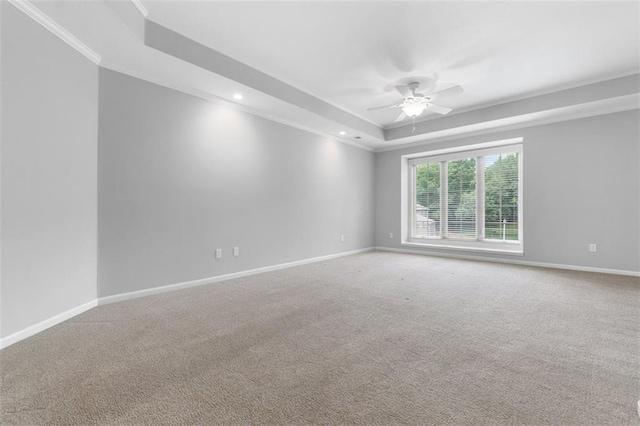 5329 Park St, Shawnee, KS 66216 - spare room featuring a raised ceiling, a ceiling fan, crown molding, carpet flooring, and recessed lighting