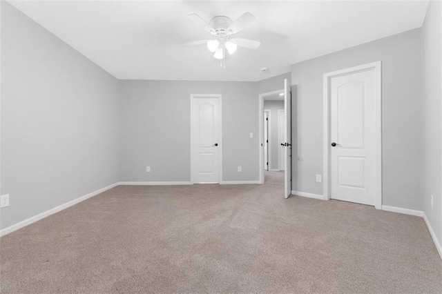 5329 Park St, Shawnee, KS 66216 - unfurnished bedroom featuring carpet and a ceiling fan