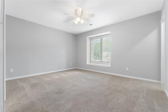 5329 Park St, Shawnee, KS 66216 - spare room with ceiling fan and carpet