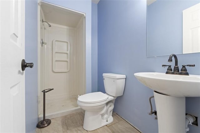 5329 Park St, Shawnee, KS 66216 - full bath featuring a shower stall and toilet