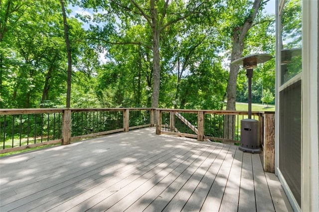 5329 Park St, Shawnee, KS 66216 - wooden terrace featuring view of scattered trees