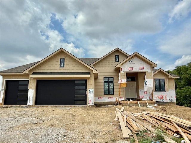 8352 NE 76th Ter, Kansas City, MO 64158 - property under construction with an attached garage, driveway, and roof with shingles