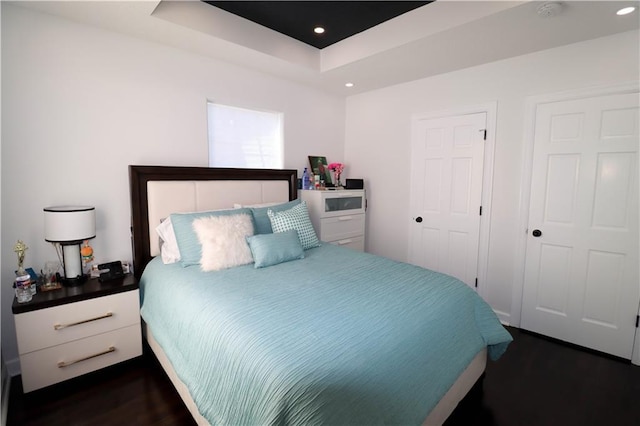 2725 N 20th St, Kansas City, KS 66104 - bedroom with wood finished floors, recessed lighting, and a raised ceiling