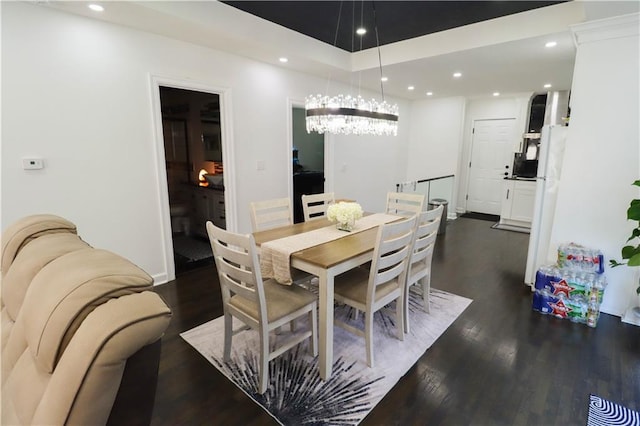 2725 N 20th St, Kansas City, KS 66104 - dining room featuring dark wood-style floors, recessed lighting, and a chandelier