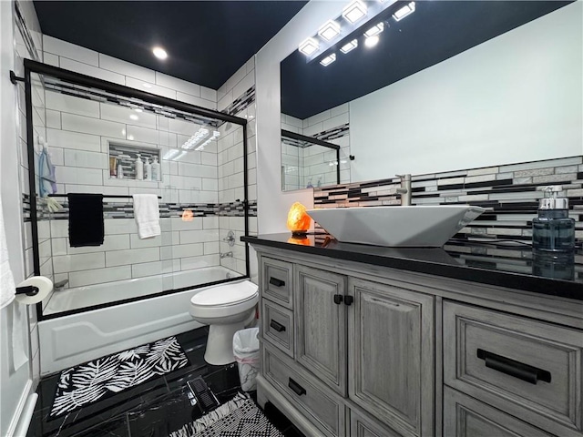 2725 N 20th St, Kansas City, KS 66104 - full bath with vanity, enclosed tub / shower combo, and tasteful backsplash