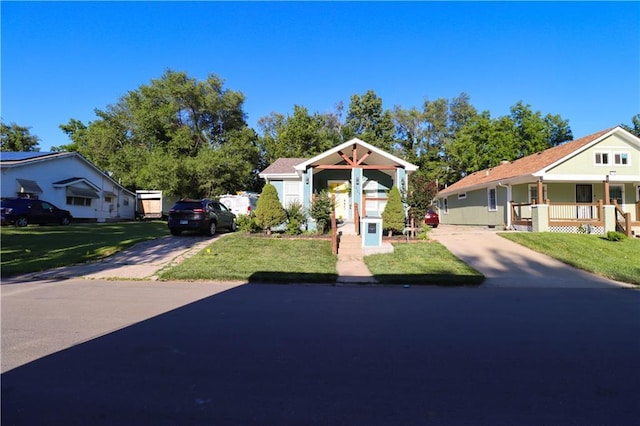 2725 N 20th St, Kansas City, KS 66104 - view of front facade with concrete driveway and a front lawn