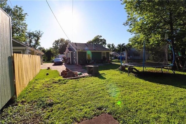 2725 N 20th St, Kansas City, KS 66104 - view of yard with a trampoline