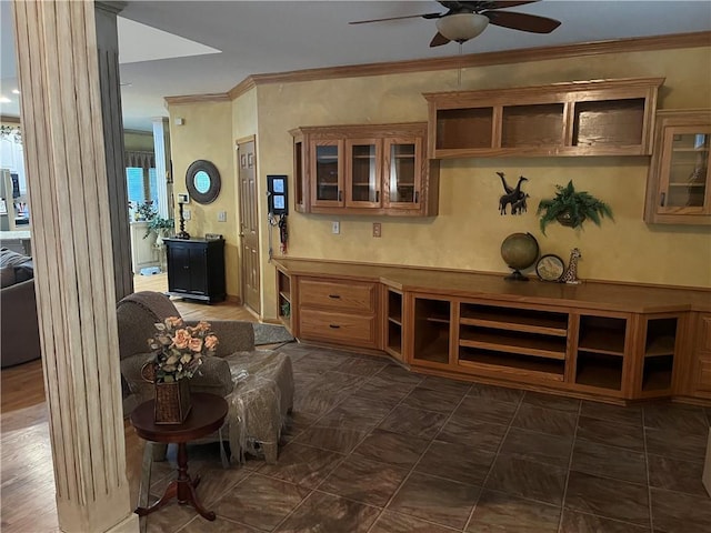 15733 Pine Cir, Basehor, KS 66007 - living area featuring ceiling fan, crown molding, and decorative columns