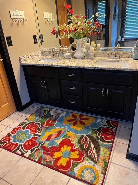 15733 Pine Cir, Basehor, KS 66007 - full bath with tile patterned floors and double vanity