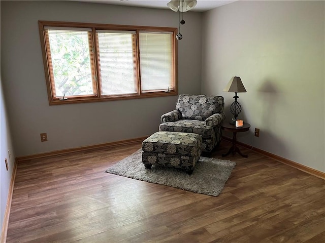15733 Pine Cir, Basehor, KS 66007 - sitting room with wood finished floors and baseboards