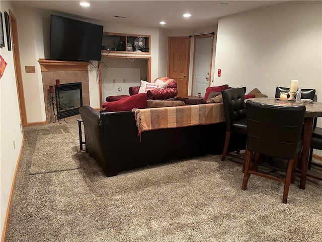 15733 Pine Cir, Basehor, KS 66007 - living area featuring carpet, recessed lighting, and a tile fireplace