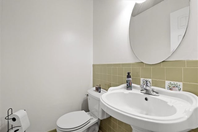 9410 Taylor Dr, Overland Park, KS 66212 - half bath featuring a sink and toilet