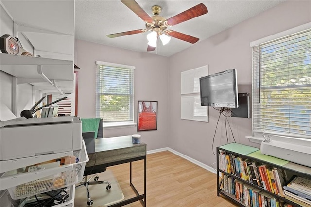 9410 Taylor Dr, Overland Park, KS 66212 - home office with wood finished floors and ceiling fan