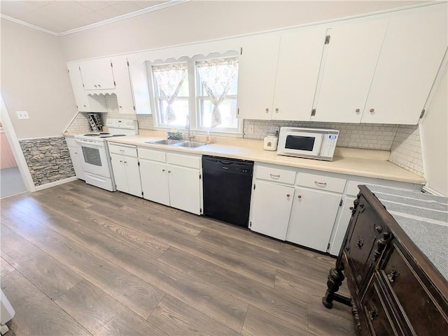 712 N Jefferson Ave, Iola, KS 66749 - kitchen featuring white appliances, ornamental molding, wood finished floors, white cabinetry, and backsplash