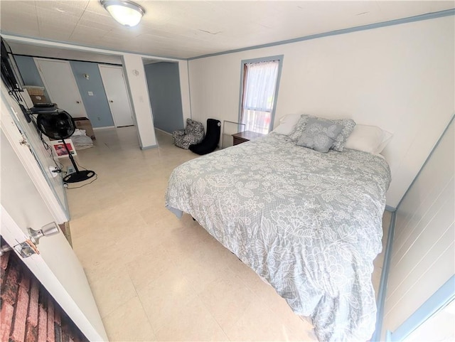 712 N Jefferson Ave, Iola, KS 66749 - bedroom with tile patterned floors