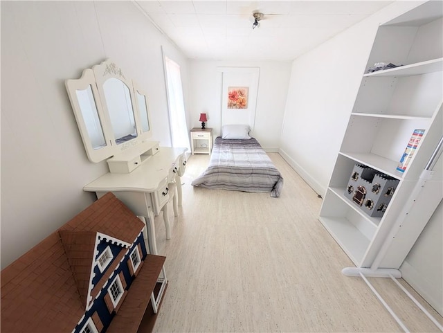 712 N Jefferson Ave, Iola, KS 66749 - bedroom with light wood-style flooring