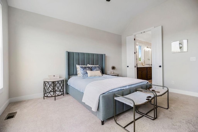 16992 S Cheshire St, Olathe, KS 66062 - carpeted bedroom featuring lofted ceiling and ensuite bath