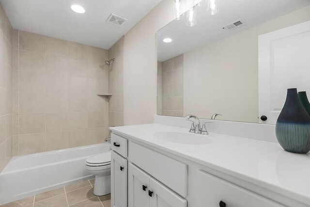 16992 S Cheshire St, Olathe, KS 66062 - bathroom featuring vanity, tile patterned flooring, tub / shower combination, and recessed lighting